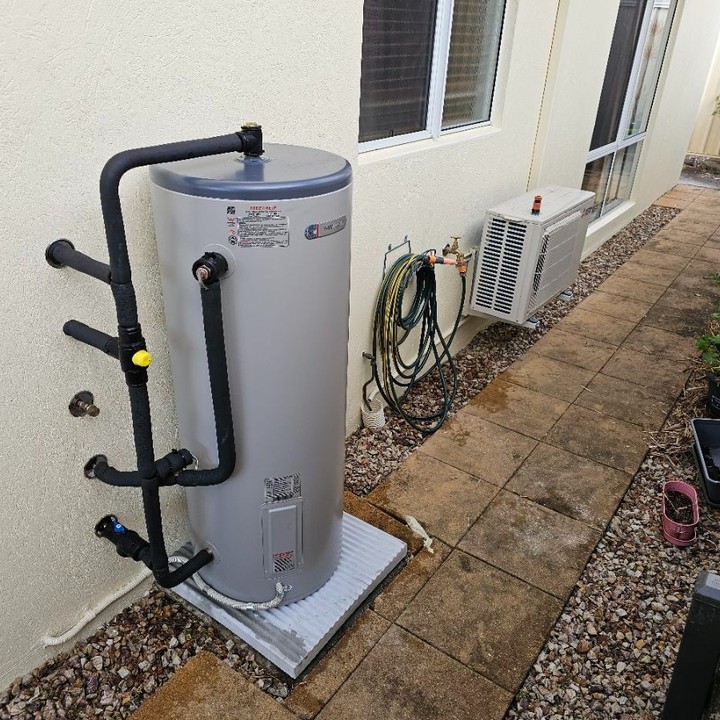 Outdoor heat pump hot water system installation by NG Trade Solutions in Brisbane