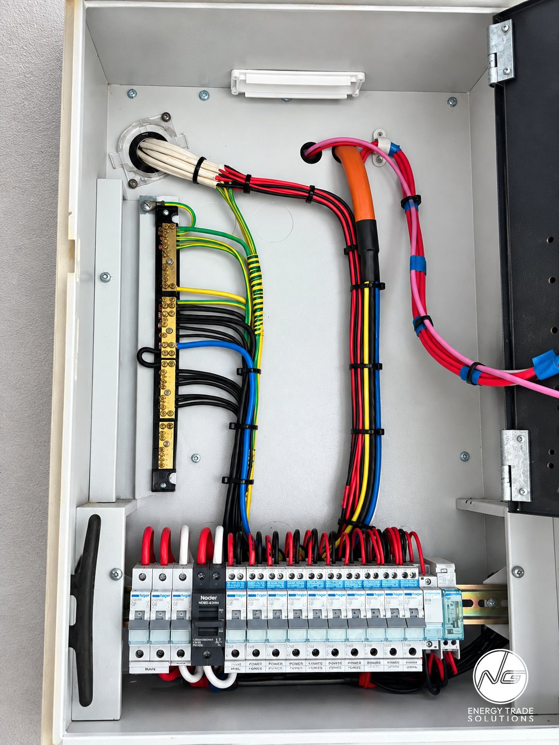 Switchboard wiring and circuit breakers after the upgrade.